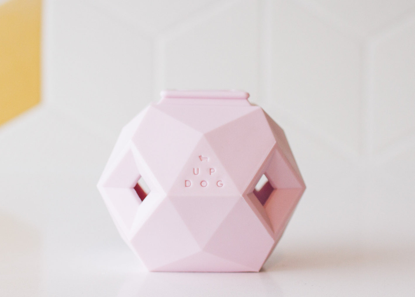 Clean Odin puzzle toy in a modern kitchen background